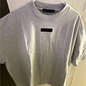 Brand new Essentials tee, oversized never worn. Lmk